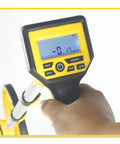 Close-up of Built Tough Digital Measuring Wheel With Backlit Display, showing a hand on control panel with metrics displayed.