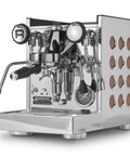 Level Up Your Home Barista Setup With This Sleek Copper And Chrome Espresso Machine Paired With A Silent Conical Burr Grinder In A Complete Bundle crafted espresso machine close-up with chrome and copper details.