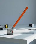 Manual Rail Cutting Tool For Electricians And Installers Hand Operated Bench Rail Cutter Heavy Duty on white table.