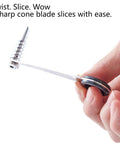 Hand holding Awesome 2 Piece Spiral Cutter And V Shape Carving Tool Set For Potatoes Cucumbers Carrots And Fruit Stainless Steel Piranha Style Tools