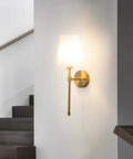 Battery Operated Wall Sconces Set Of 2 With Rechargeable Magnetic Bulbs, RGB Dimmable Wireless Bedroom Lights Up To 50 Hours Runtime, Sleek Brass Remote Fixture For Plug Free Space Glow Ups And Daily Vibe Decor mounted on wall next to stairs.