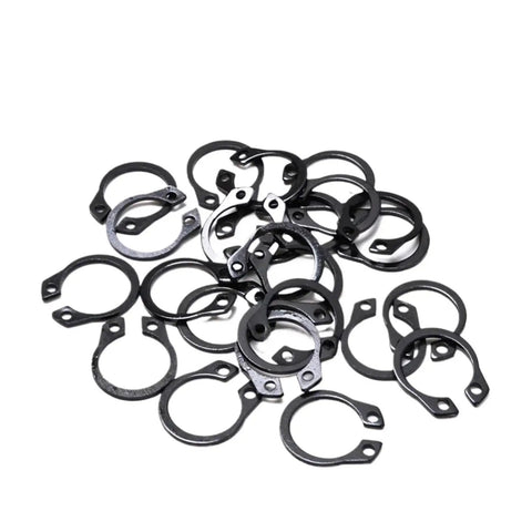 A pile of Heavy Duty External C Type Circlip Retaining Rings For Shafts Built To Last Burr Free Surface Carbon Steel Black Finish