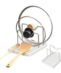 Handy Dandy Two In One Spoon Rest And Pot Lid Holder For Kitchen Counter with wooden spatula and spoon on a white base.