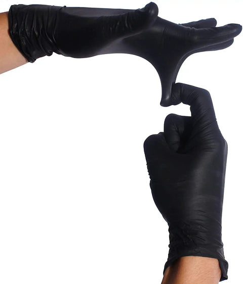 Person stretching Heavy Duty Nitrile Gloves With Micro Textured Fingertips For Maximum Grip Like A Boss, Powder Free, Medium Size