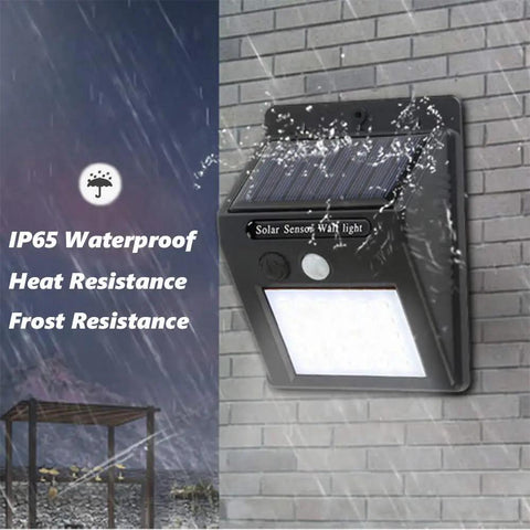 Upgraded Solar Motion Sensor Lights Outdoor 30 LED Wireless Waterproof Security Lights mounted on wet brick wall