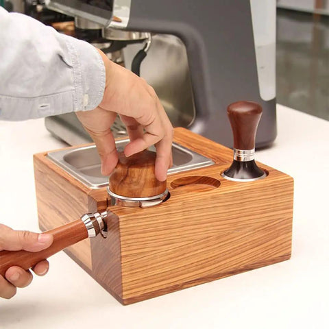 Espresso Tamping Station With Knock Box And Solid Wood Filter Holder Fits 58Mm Portafilters, shown with tamping process.