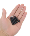 Top Tier 5 Piece Copper Soldering Iron Tips Set Including Durable Model I B K And 2.4d Nozzles held in hand, black-coated, wear-resistant.
