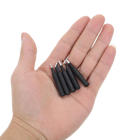 Top Tier 5 Piece Copper Soldering Iron Tips Set Including Durable Model I B K And 2.4d Nozzles held in hand, black-coated, wear-resistant.