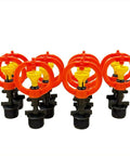 Close-up of sprinkler heads from 10 Set Half Inch Orange Drip Irrigation Kit With Misting Drippers Tubing Connectors And Sprinkler Heads For Quick Easy Setup Customizable Watering Of Garden Lawn Farm And Veggie Beds.