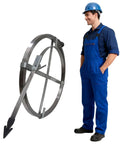Heavy Duty Drain Auger Tool Featuring Knockout Impact Head And Indestructible Steel Cable next to a smiling worker in blue overalls.