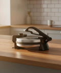 Leefasy Electric Pancake Maker With Nonstick Round Plate And Stainless Steel Construction on kitchen countertop.