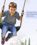 Child swinging on heavy duty plastic swing seat with non-slip design, adjustable rope, built for indoor or outdoor playsets.
