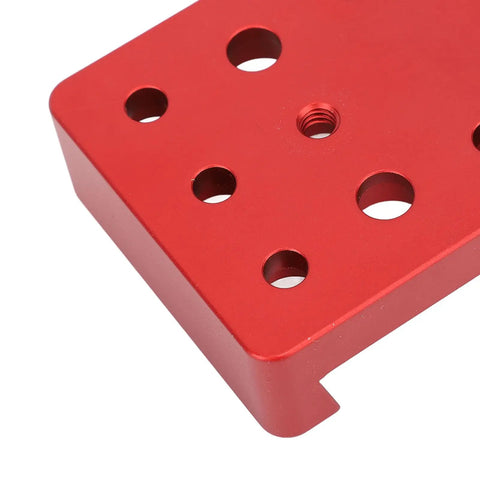 Rugged Aluminum Dovetail Clamp with 8 multi diameter mount holes for telescopes and camera rigs, close-up view