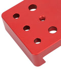 Red aluminum alloy saddle mount base close-up with multiple holes, part of Heavy Duty Dovetail Clamp For Telescopes And Cameras.