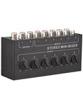 Six Channel Passive Stereo Mixer With RCA Inputs And Two Channel Output, top view of portable audio gear with knobs