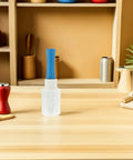 Four Rolls Stretch Film Wrap With Ergonomic Handles For Moving And Packing High Performance LLDPE Cling Plastic Wrap Built Tough For Protective Transport And Shipping Supplies on a kitchen countertop.