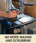 Person using ArmorGlide 18-Inch Woodworking Bandsaw With 5 HP 230V 1Ph Power, PM1800BT Model with sandpaper on work surface.