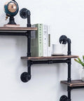 Black 4 Way Cross Pipe Fitting Connector For Furniture And Decor used in wall shelf with books and decorations