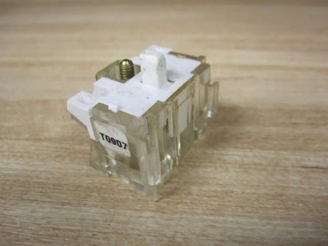 Heavy Duty Ht8a Normally Open Contact Block For Thirty Millimeter Push Buttons And Switches Industrial Grade Replacement Hardware on a wooden surface.