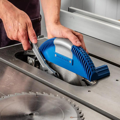 Blade-Lock Table Saw Blade Change Tool For 10 Inch Saws in use showing secure clamp system and rugged cast aluminum housing