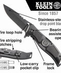 Klein Tools folding pocket knife with black handle, stainless blade, bearing-assisted flip, belt clip, front view.