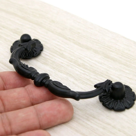Close-up of one Six Pcs Vintage Black Drawer Pulls Handles Metal Bail Pulls, made of zinc alloy with an anti rust finish.
