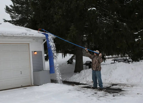 Roof Snow Rake With Seventeen Inch Wide Head And Fifteen And A Half Foot Telescoping Pole For Quick Snow Removal From The Ground No Fuss Snap Together Assembly With Four Fiberglass Handles Ideal Roof Clearing Tool Assembled In The USA, clearing snow from roof edge