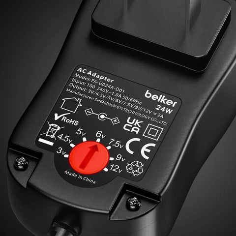 Label view of Universal 24W AC DC Wall Wart Power Adapter With 8 Interchangeable Tips for Router Light Strip CCTV Camera Speaker