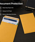 10x13 Inch Kraft Mailing Envelopes With Gummed Seal Closure 28lb heavyweight Manila catalog envelopes holding documents on desk