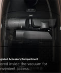 Integrated accessory compartment of Premium Bagged Canister Vacuum For Hard Floors And Thin Carpet Featuring XL Parquet Brush Universal Floorhead Footswitch Hygienic Air Filter.