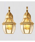 Modern Retro Copper Wall Lamp Sconce For Bedroom And Hallway Wall Mounted Light Fixture With Built Tough All Copper Cast Body Dry Location Rated For Living Room And Porch Vibes Straight Up Quality One Pack - two golden wall sconces with warm light.