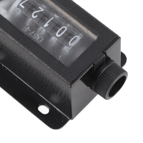 Close-up of 5 Digit Mechanical Tally Counter Workhorse With Resettable Dial And Rotating Zero For Industrial Counting Tasks Rugged Durable Plastic Body Lightweight 82g Compact Design showing reset knob.