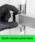 Gloved hand engaging quick release on a Heavy Duty Door Security Bar For Inward Swing Front Doors Fits 32 To 36 Inches Built Tough With Wall Stud Mount And 2000 Pound Resistance For Real Home Safety No Drilling Required And Solid Metal Bar With 3 Inch Screws