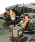 Close-up of M1A2 Abrams Main Battle Tank Model Kit in 1 35 Scale showing soldiers and realistic detailing on durable parts.