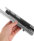 Close-up of hand holding Hidden Two Part 10 Inch Slow Closing Drawer Slides With Detachable Silent Glides No Squeak And Bottom Support
