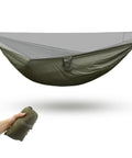 Cozy Hammock Underquilt Protector Water Resistant Cover with nylon ripstop shown in OD green, compactly packed in hand.