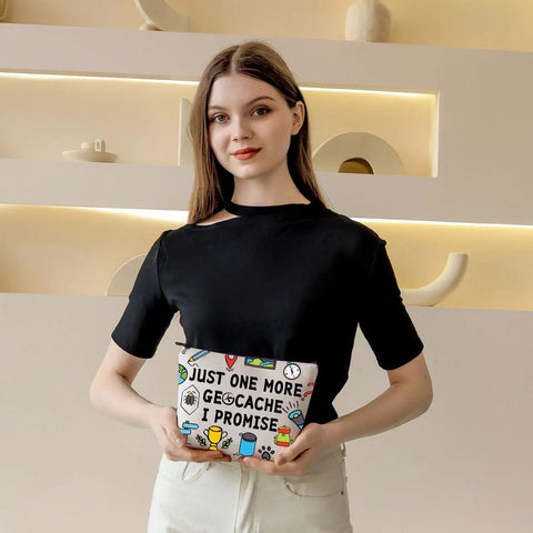 Person holding Just One More Geocache I Promise Makeup Bag For Geocachers Outdoor Lovers Travel Pouch in room setting