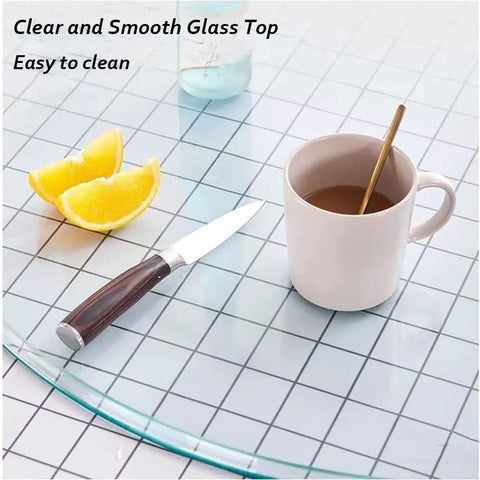 Round Tempered Glass Lazy Susan Turntable with Large Aluminum Base showing a smooth, clear glass top with a cup and lemon slices.