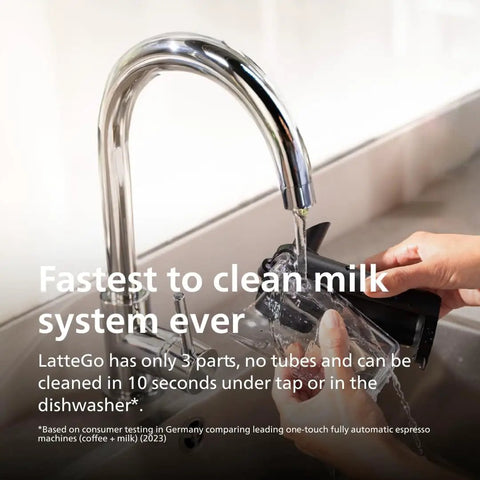 Hand washing LatteGo milk system component from 5500 Series Fully Automatic Espresso Machine With LatteGo Milk System under a tap.