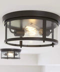 Two Light Outdoor Flush Mount Light In Antique Bronze With Clear Glass Diffuser, Farmhouse Vibe That Boosts Curb Appeal For Covered Patios