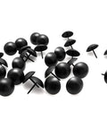 Badass Black Nailhead Trims And One Inch Furniture Upholstery Tacks For Diy Home Renovations Heavy Duty Steel Nail Pins With Sleek Matte Surface To Give Your Couch Or Cabinet A Dope Fresh Look Today, shown as a pile of matte black tacks.