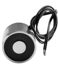 Heavy Duty DC 24V Suction Cup Electromagnet Locks Down Steel With Knockout Eleven Pound Pull Dead Fast Zero Residual Release Fits Twenty Five By Twenty Millimeters Plug And Play Setup For Any Tough Job Site, showing the compact design with wires.