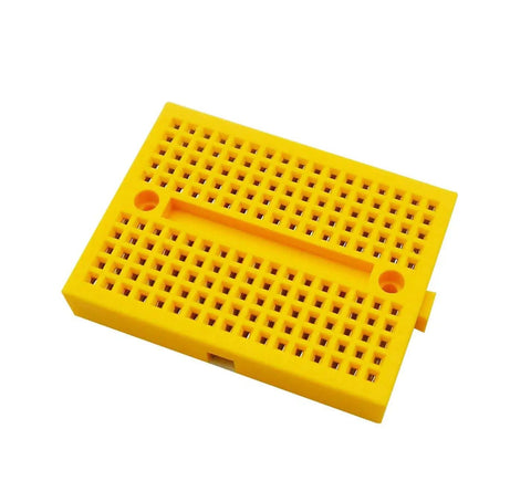 Yellow ABS board from Six Piece 170 Tie Points Mini Breadboard Kit With 65 Jumper Wires For Arduino And Raspberry Pi Diy Projects Solderless