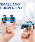 Mini RC Truck 1/64 Scale Alloy Monster Truck With Lights, 2.4GHz Remote Control Car held in hands for size reference