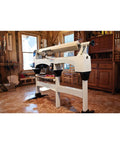 Forty Three Inch Lathe Bed Extension For Jwl 1221Vs Woodworking Turnery Crafted From Heavy Duty Cast Iron installed in a workshop.
