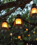 Battery Operated LED Vintage Lanterns With Remote, Rustic Outdoor Decor With Realistic Flickering Flame hanging from tree
