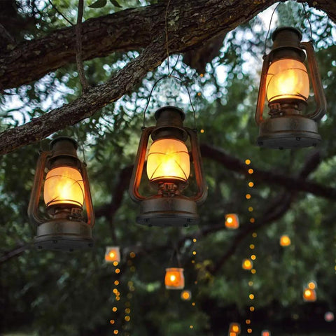 Battery Operated LED Vintage Lanterns With Remote, Rustic Outdoor Decor With Realistic Flickering Flame hanging from tree