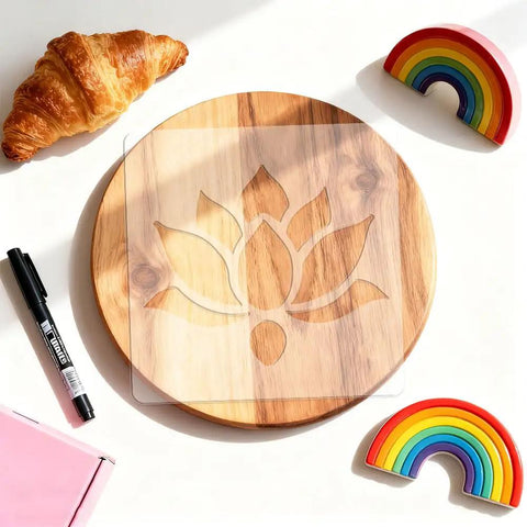 Lotus Flower Acrylic Router Template Seven Nine Inch Square Dead On Clear Floral Inlay Guide over wooden tray with croissant.