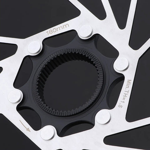 Close-up of 160mm centerlock disc brake rotor showing locking mechanism and cooling structure for mountain and road bikes.