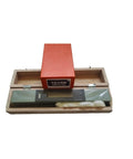 Top Shelf Pro Bar Level With Dead On 0.02mm Accuracy in wooden case, showcasing precision ground base and integrated vial housing.